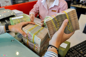 Ngân hàng đua nhau giảm lãi suất tiết kiệm theo quy định của NHNN